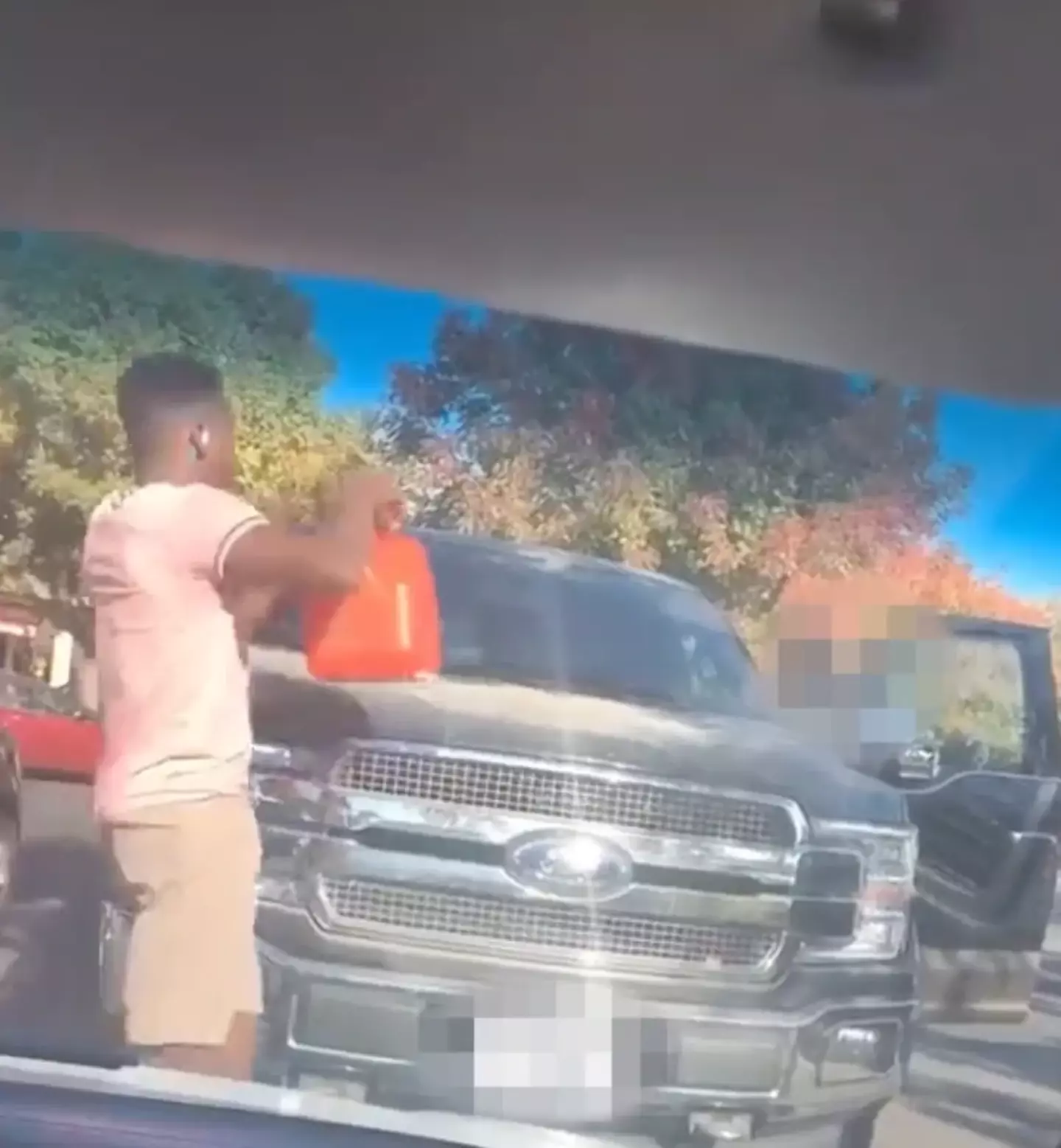 Live streamer pouring 'gasoline' on cars for a prank.