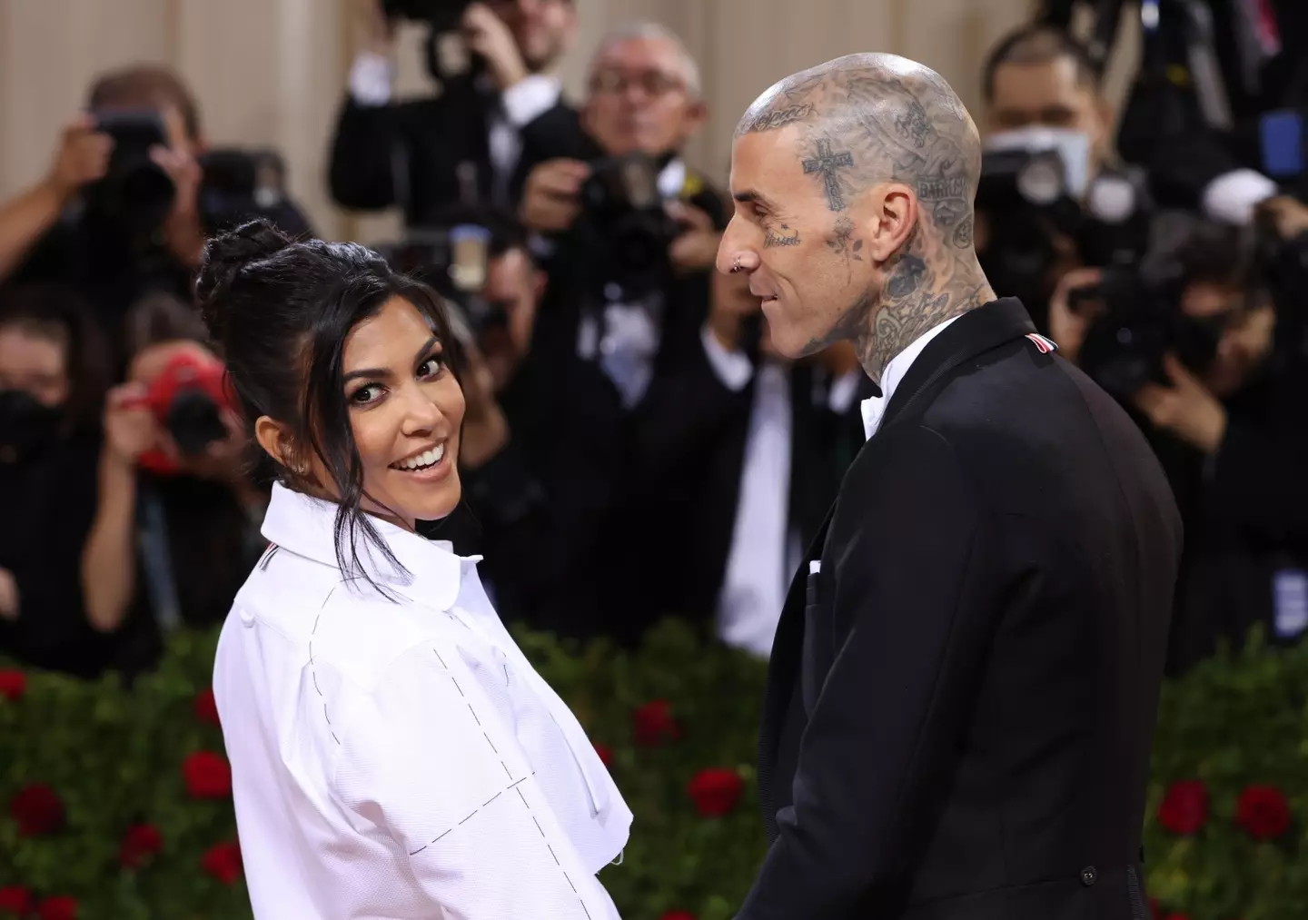 Travis Barker fans are speaking out against the musician being labelled as 'Kourtney Kardashian's husband'.