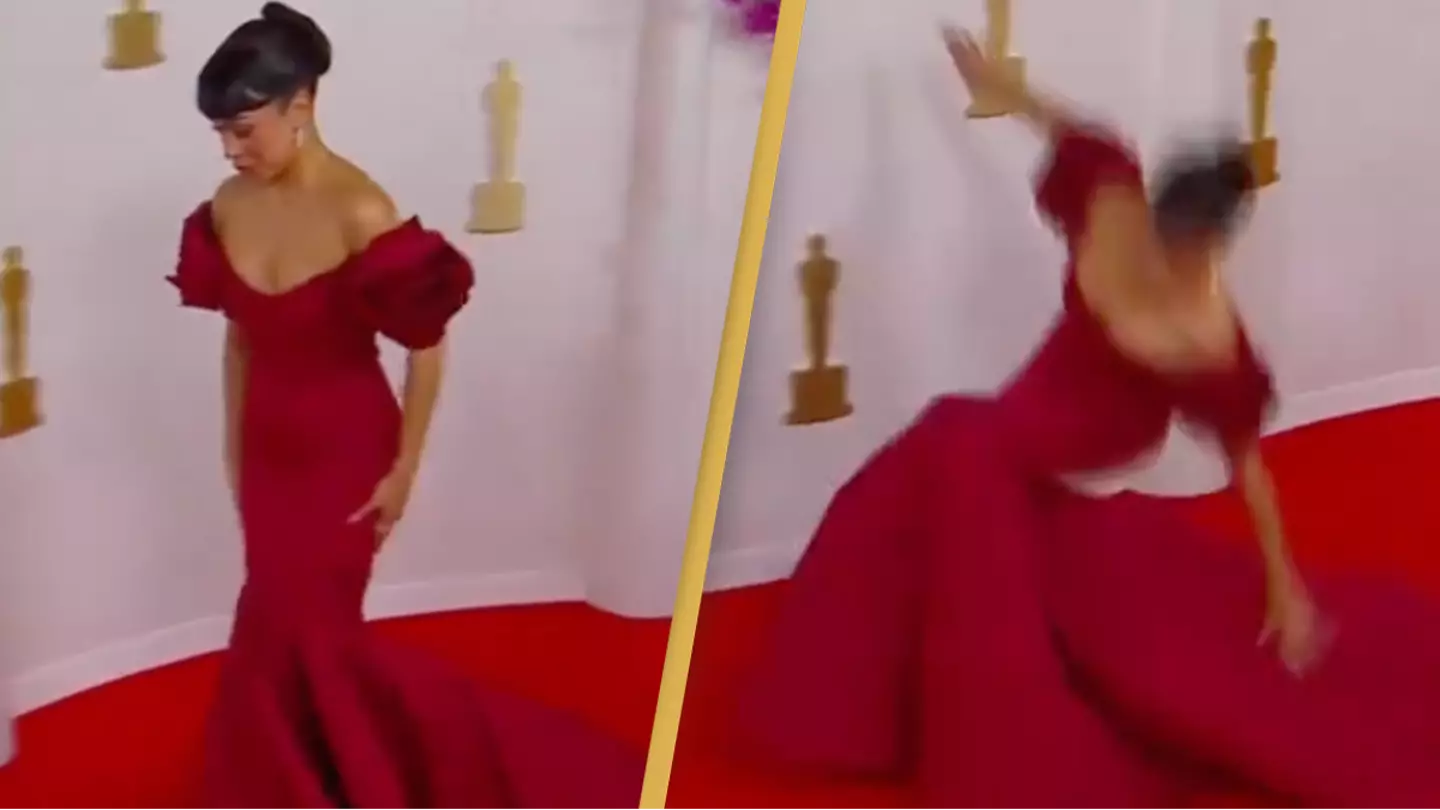 Liza Koshy falls over on the Oscars red carpet