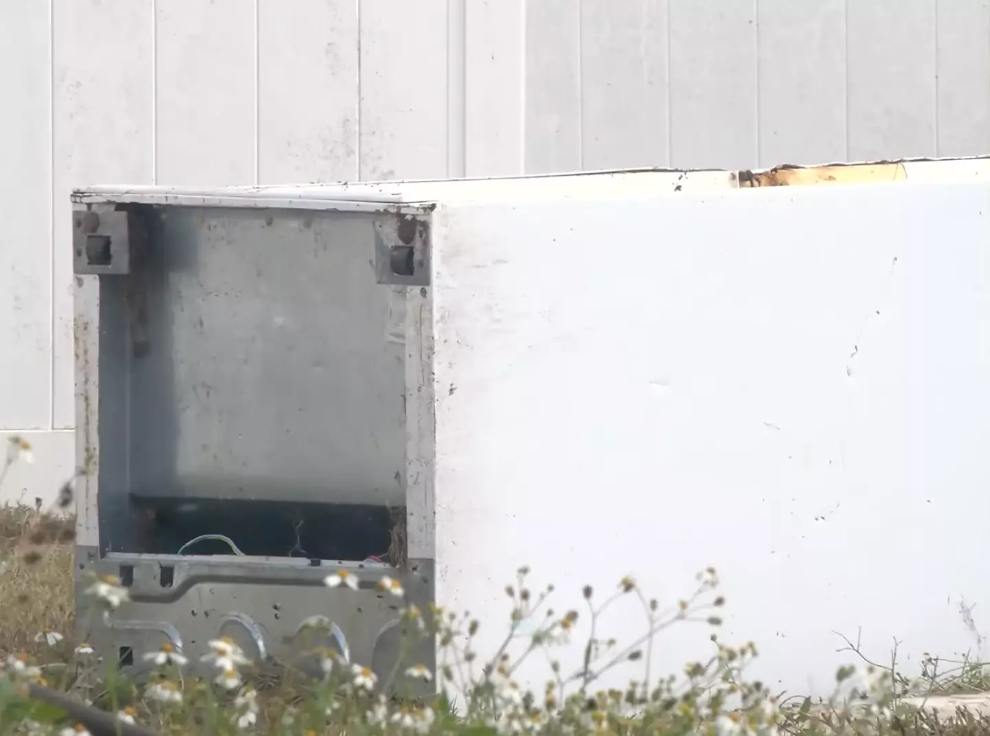 The body had been left in the abandoned freezer.