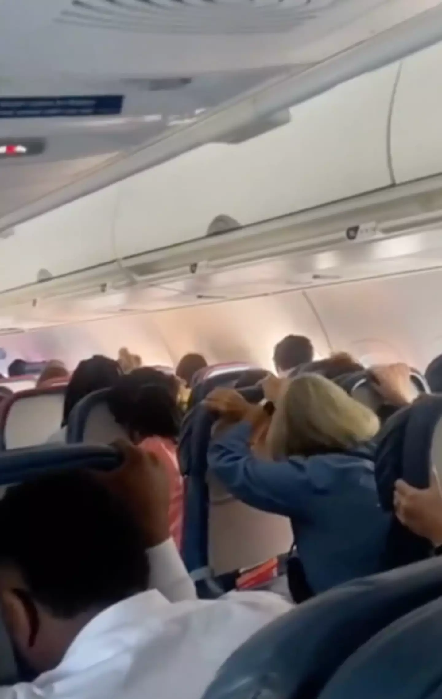 The passengers anxiously brace themselves for impact in the new clip.