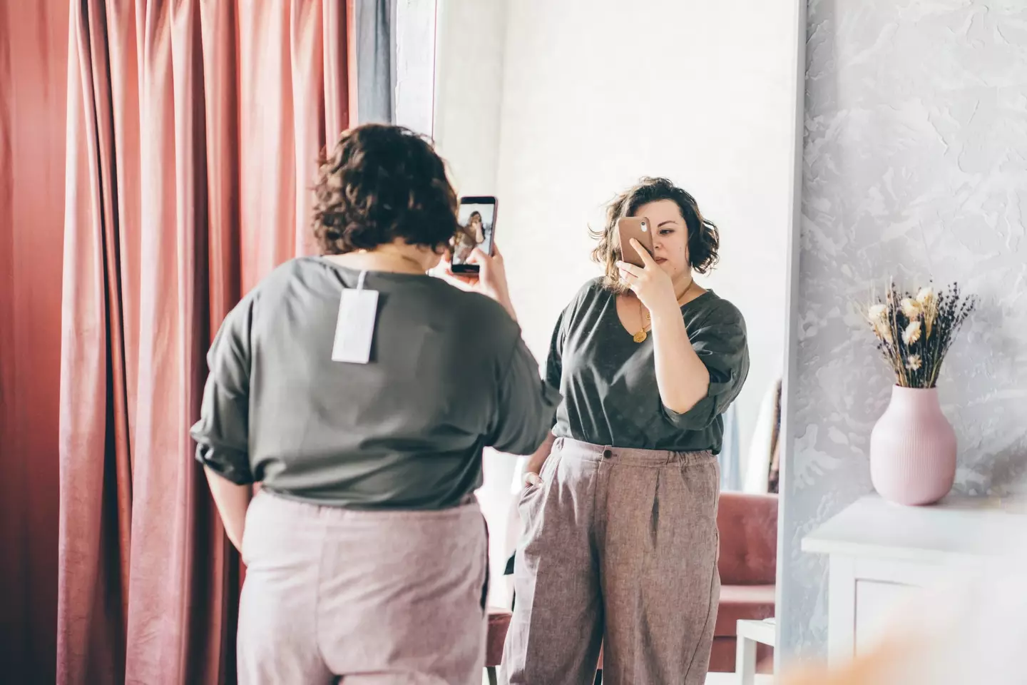 A plus-sized person may have to try on both XXL and 2XL to understand which fits better (Getty stock)