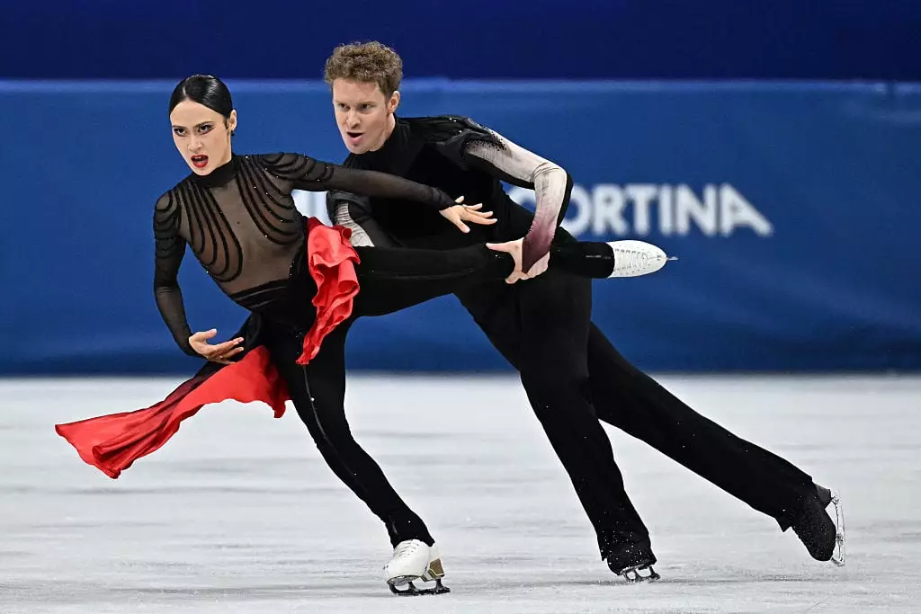 Madison Chock and Evan Bates were handed silver (Photo by Gabriel BOUYS / AFP via Getty Images)