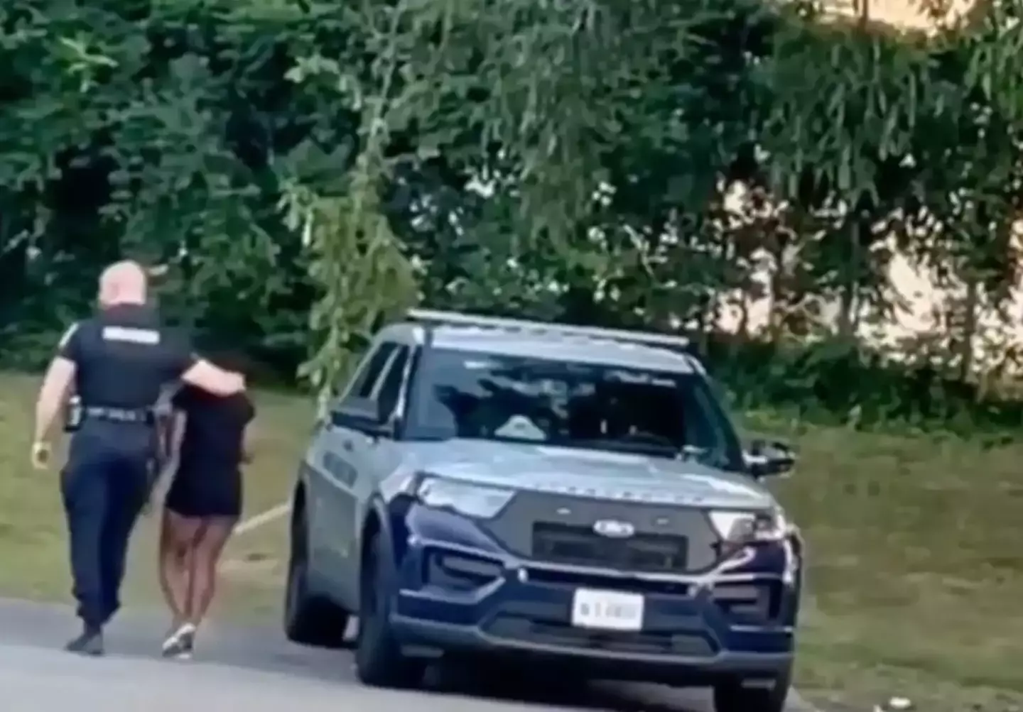 The video of the pair in a car park has gone viral.