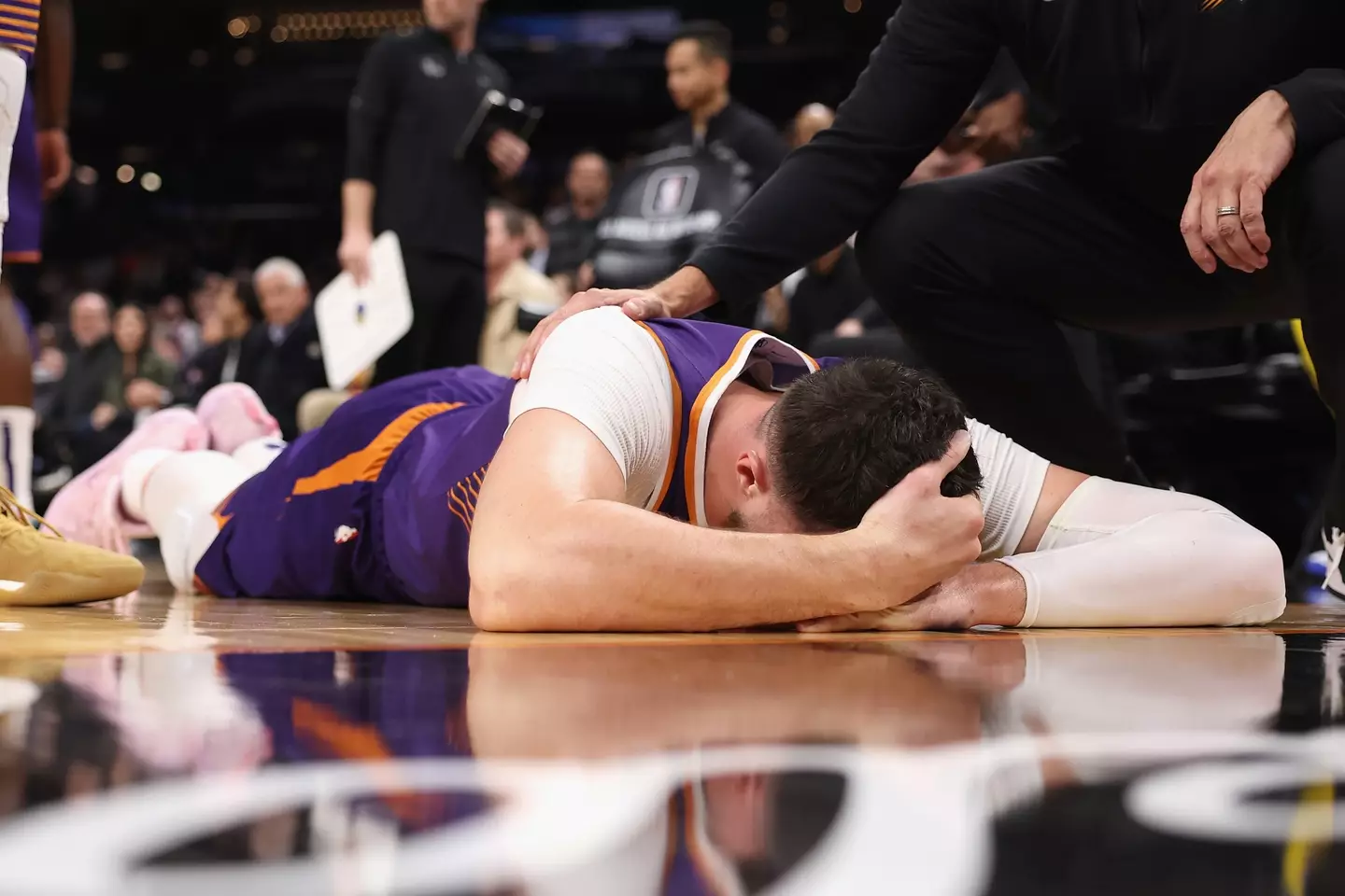 Jusuf Nurkic fell to the ground after being struck.