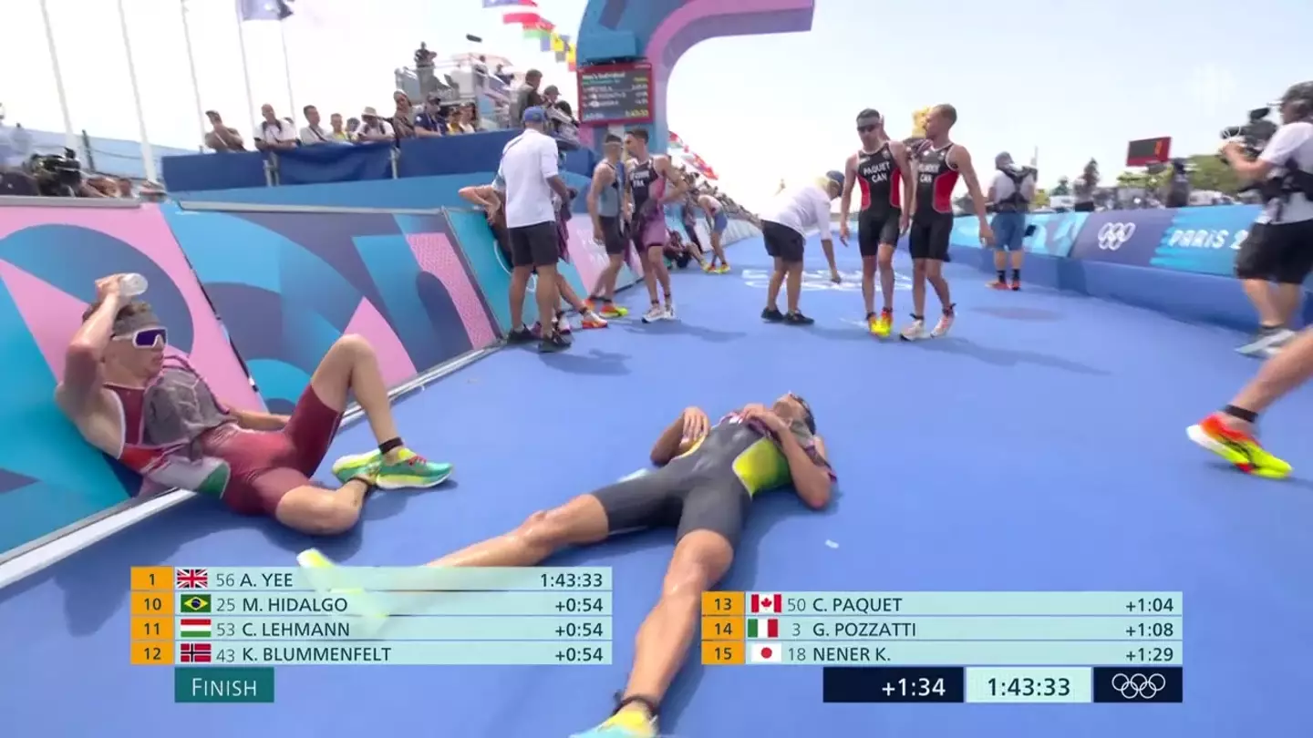 The Olympic triathletes can be seen laying down after the gruelling race. (BBC/NBC)