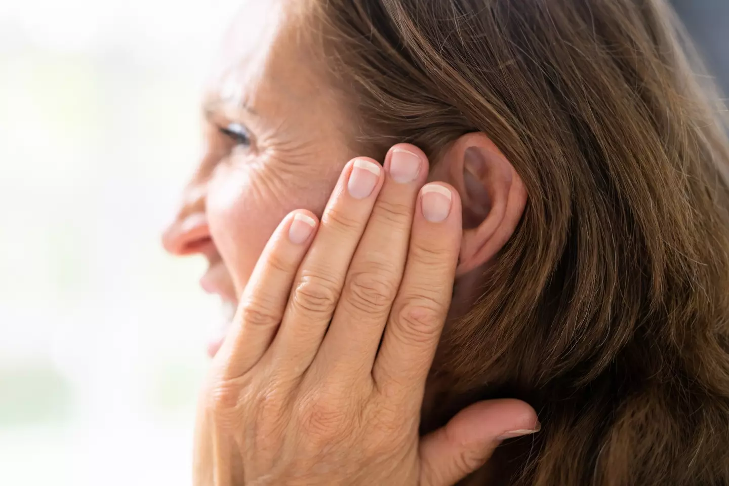 A doctor has revealed persistent blocked ears could be a sign something is wrong (Getty Stock Image)