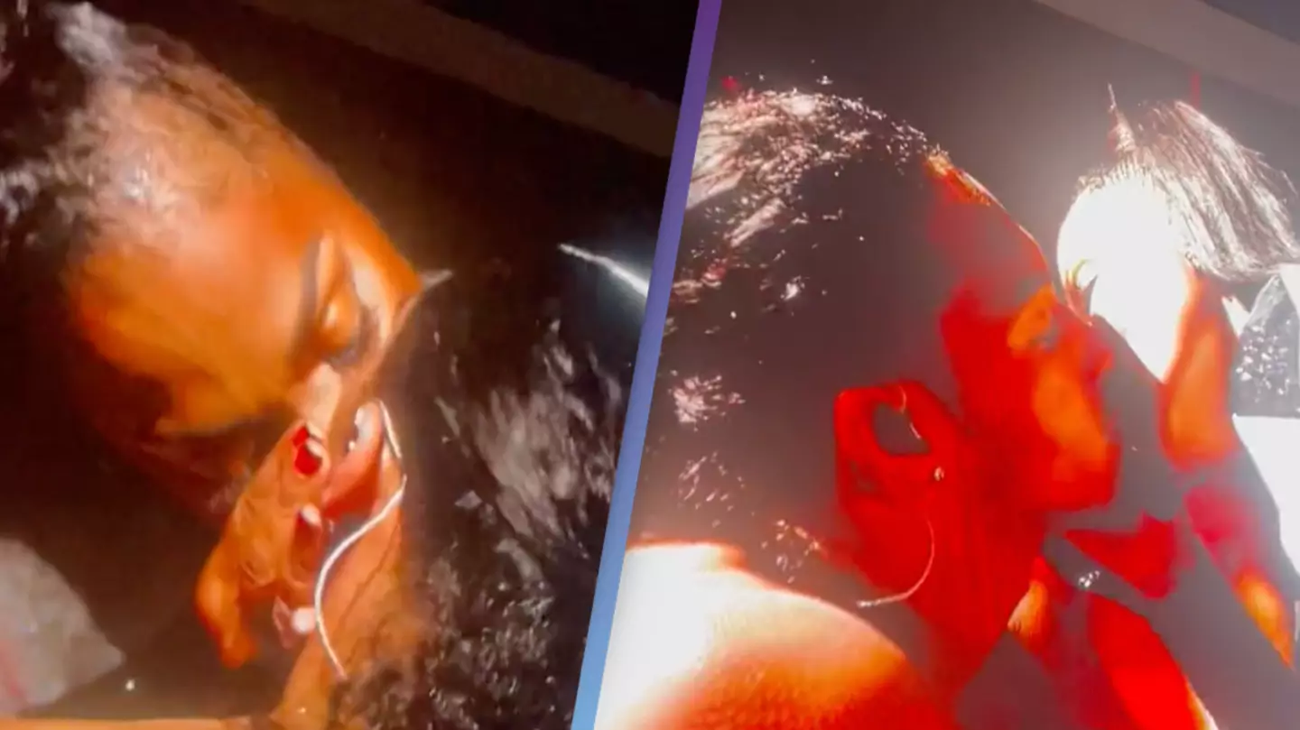 Fans freak out after Janet Jackson seductively kisses dancer on stage