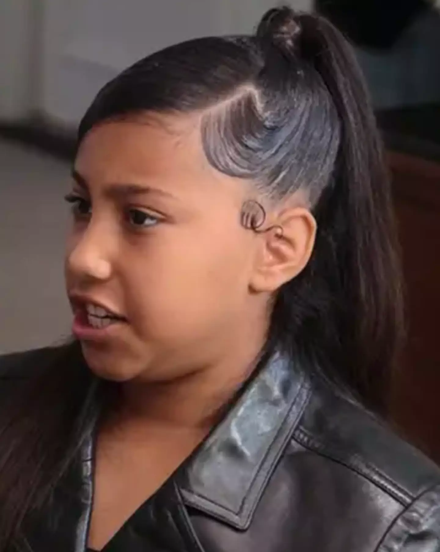 North laced on the criticism against the pearl dress during a fitting.