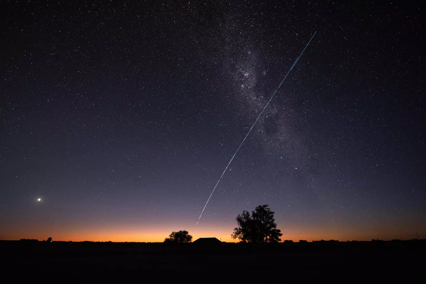 A trail of SpaceX's Starlink G6-27 satellites passing over Uruguay captured late last year (MARIANA SUAREZ/AFP via Getty Images