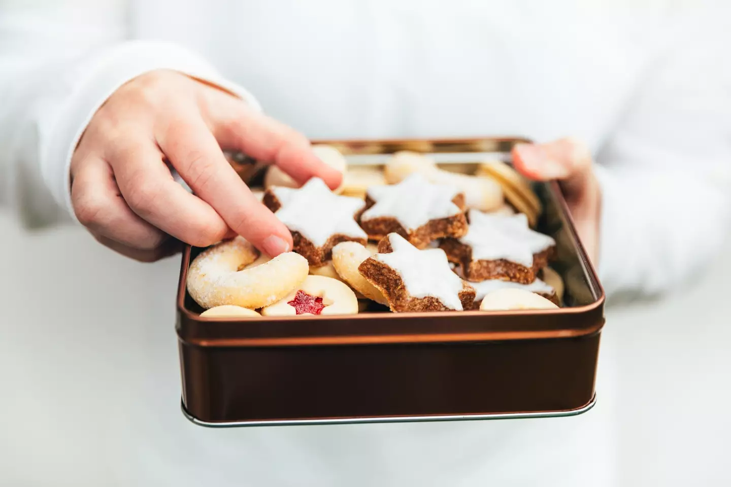 Learning how to put the cookie down is a key part of 'natural' weight loss (Getty Stock Image)