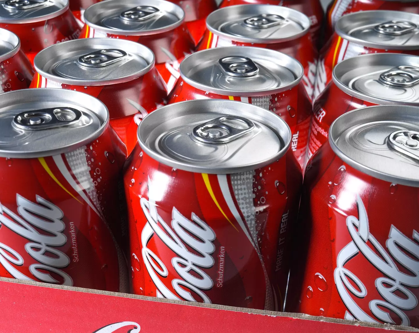 Buffett drinks five cans of Coke each day.