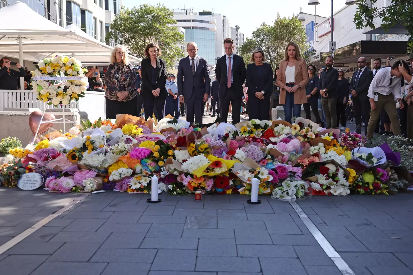 People are rushing to pay tribute to those lost in the attack (DAVID GRAY/AFP via Getty Images) 