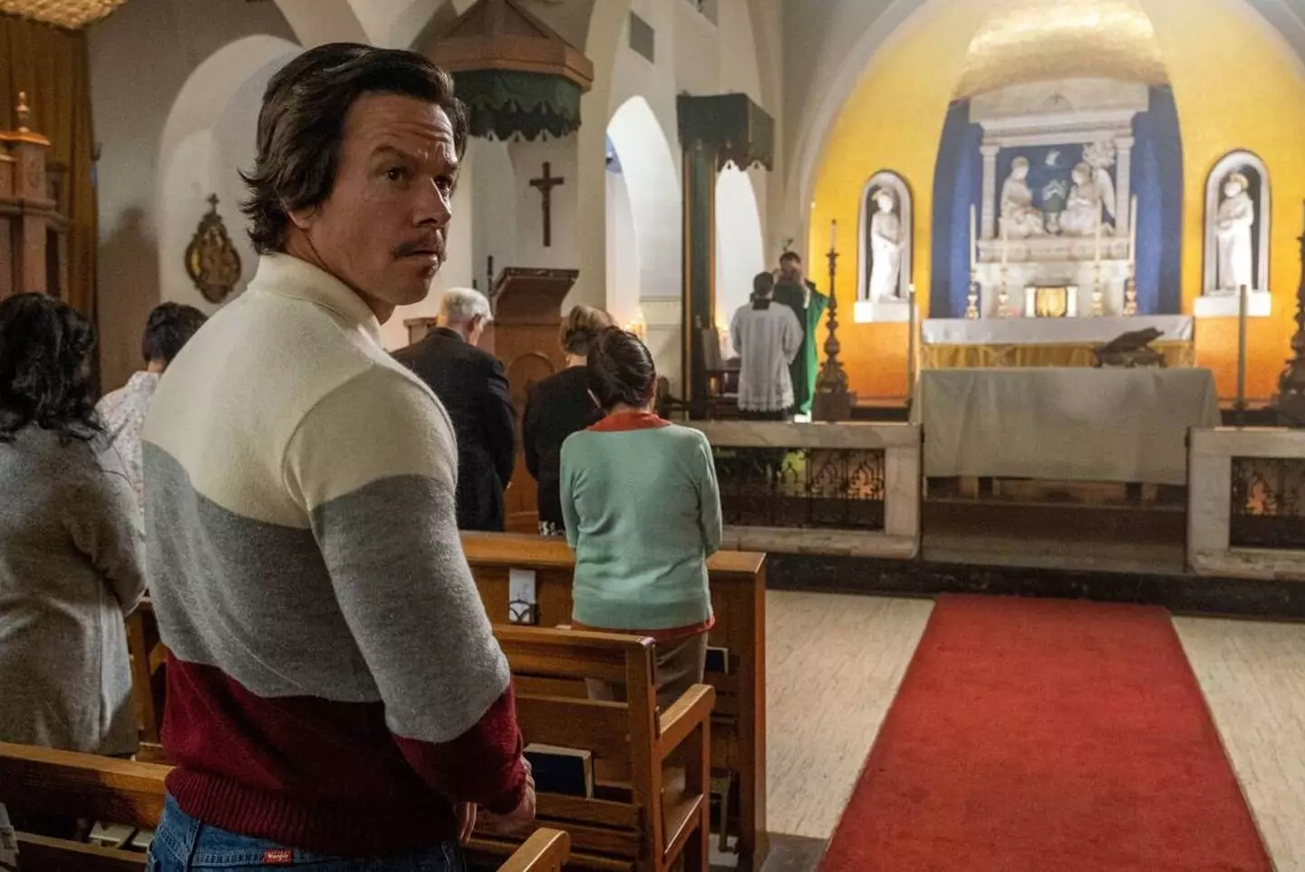 Mark Wahlberg as Father Stu.