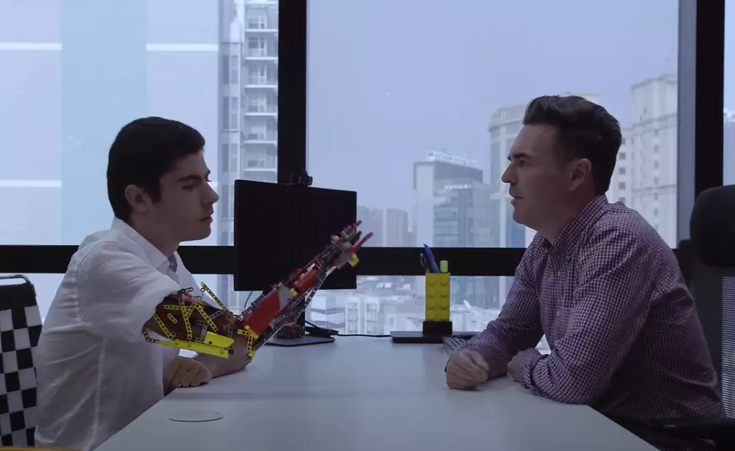 David Aguilar with one of his Lego prosthetic creations.