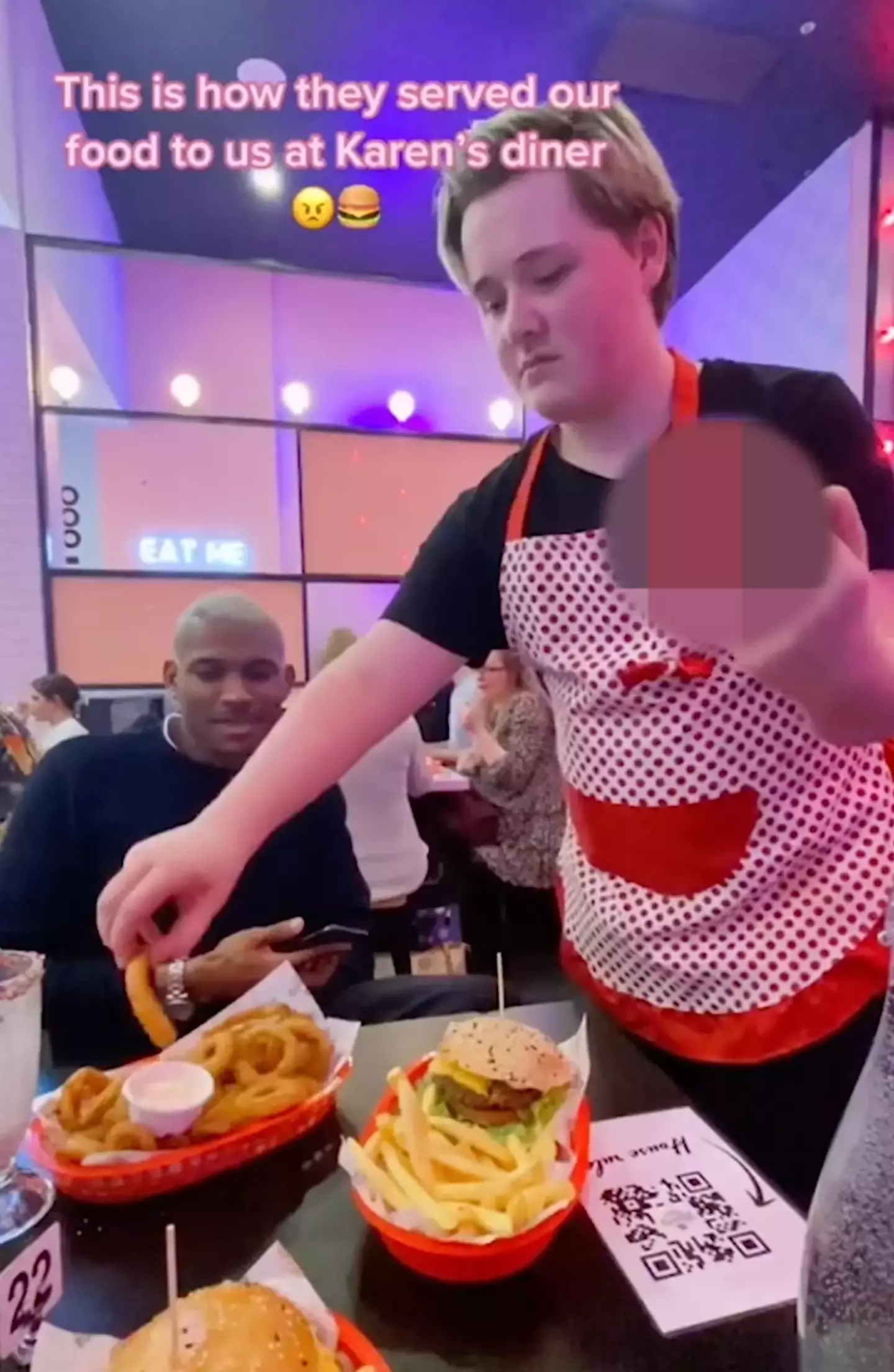 The member of staff even ate some of the customer's food.