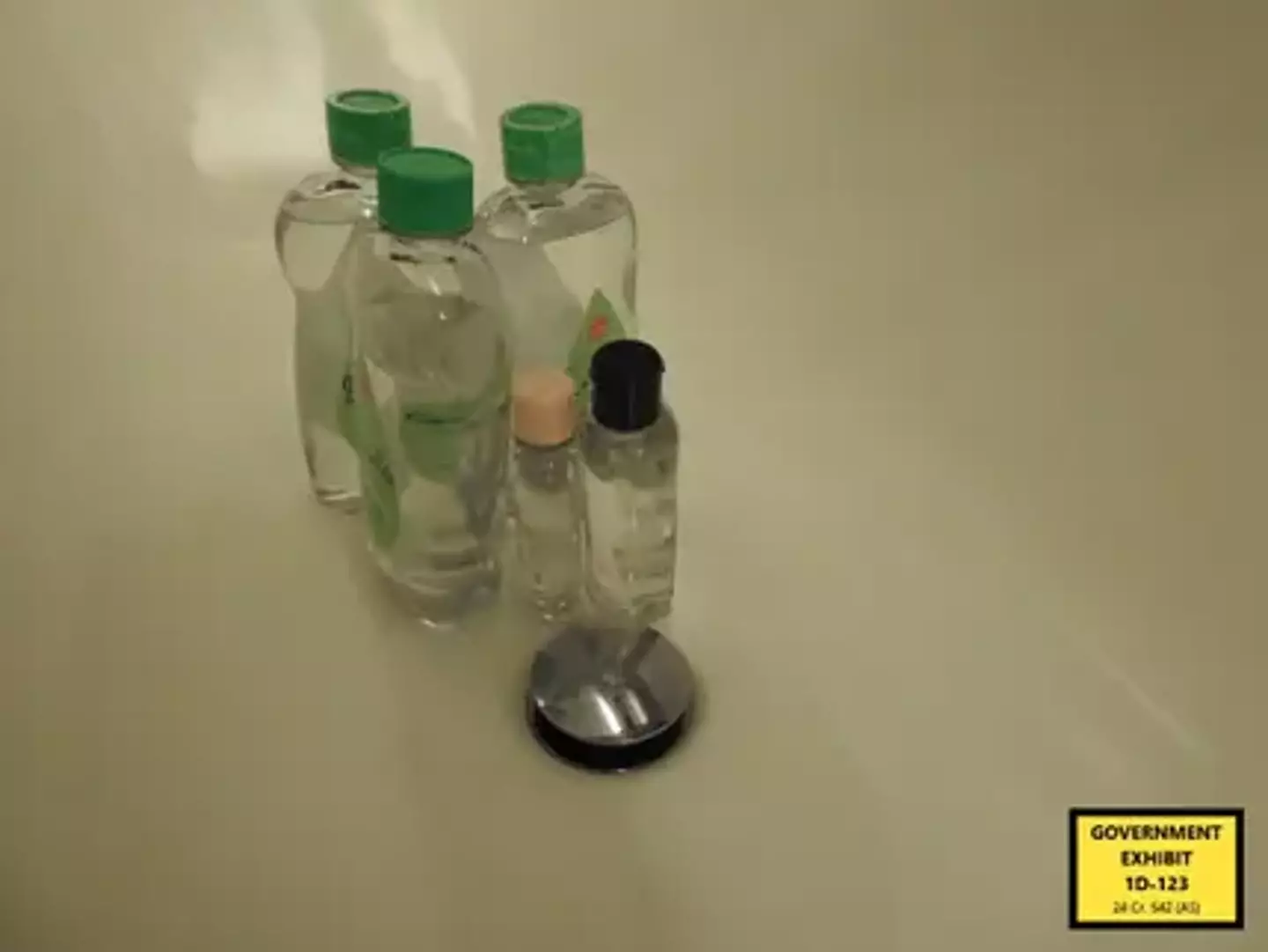Copious amounts of baby oil were discovered in the hotel room (Department of Justice)