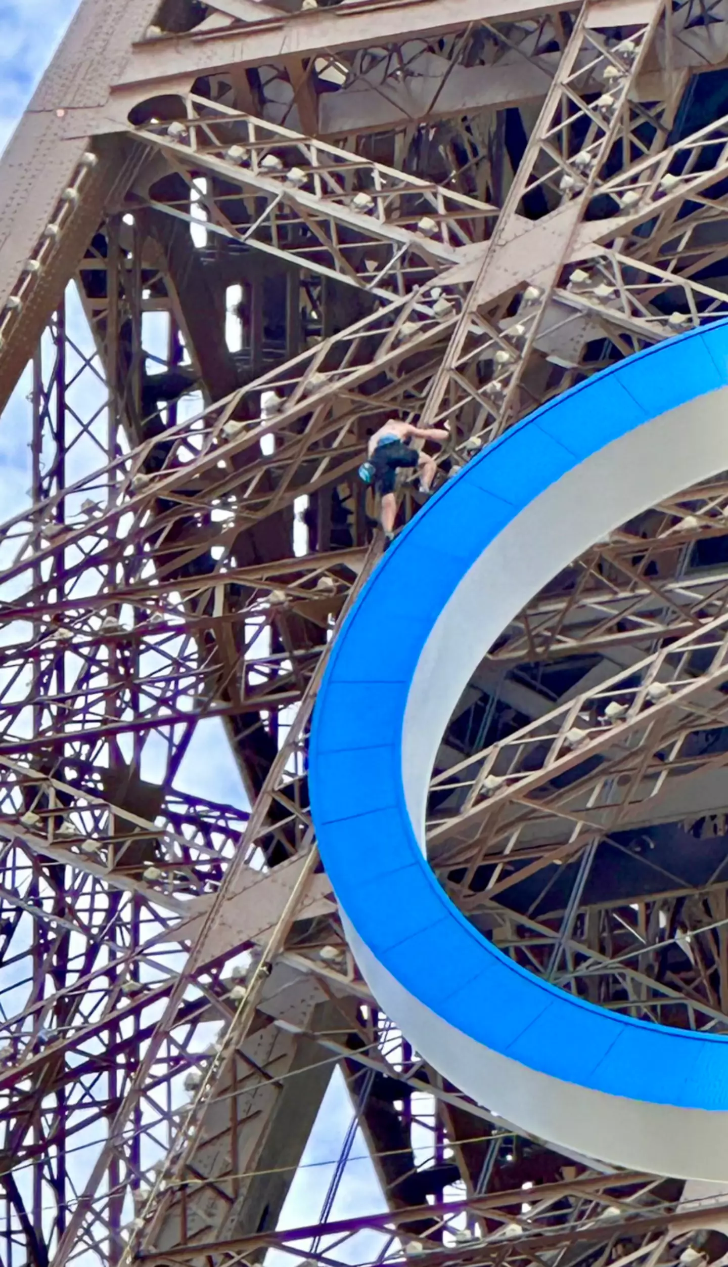 A man could be seen climbing the Eiffel Tower. (Twitter/@kevinwinston)