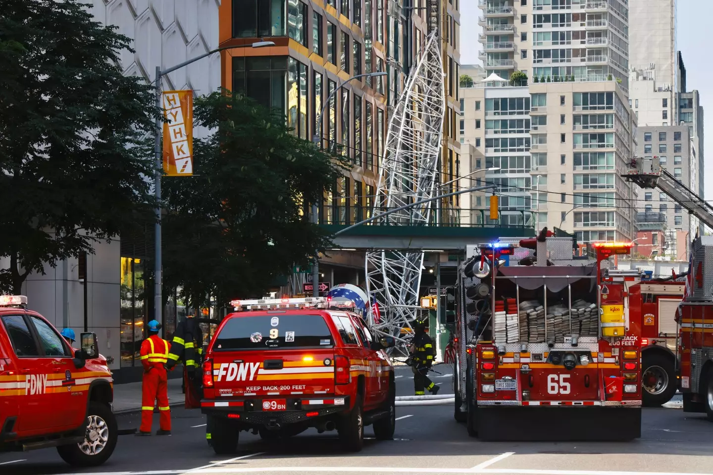 The long arm of a crane fell onto the streets of New York after a serious fire.