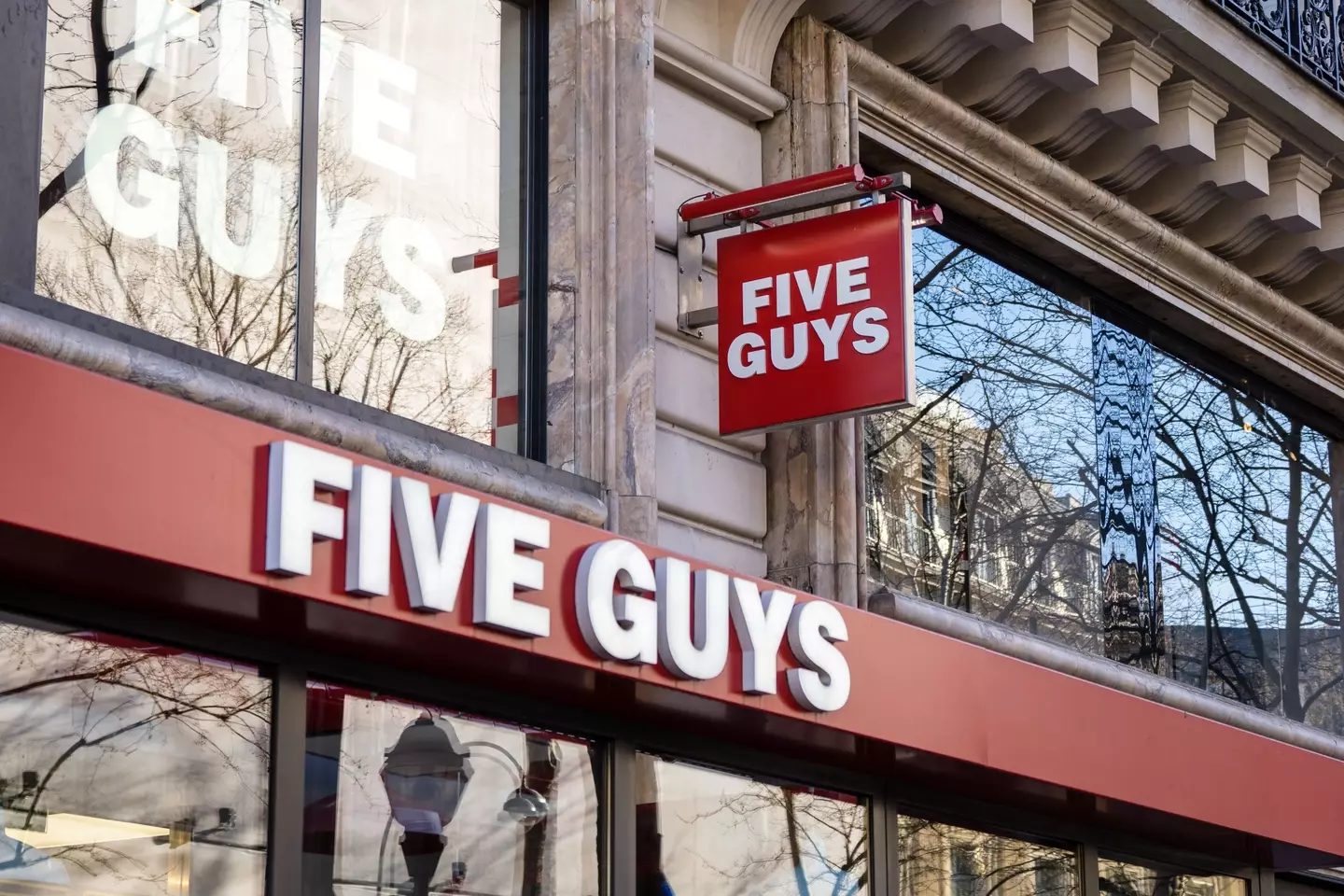 An explanation for the prices at Five Guys has been provided.