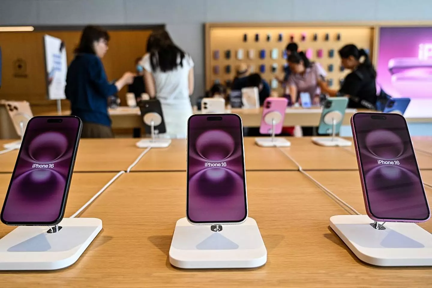 The tariffs would have made items like iPhones much more expensive for Americans (HECTOR RETAMAL/AFP via Getty Images)