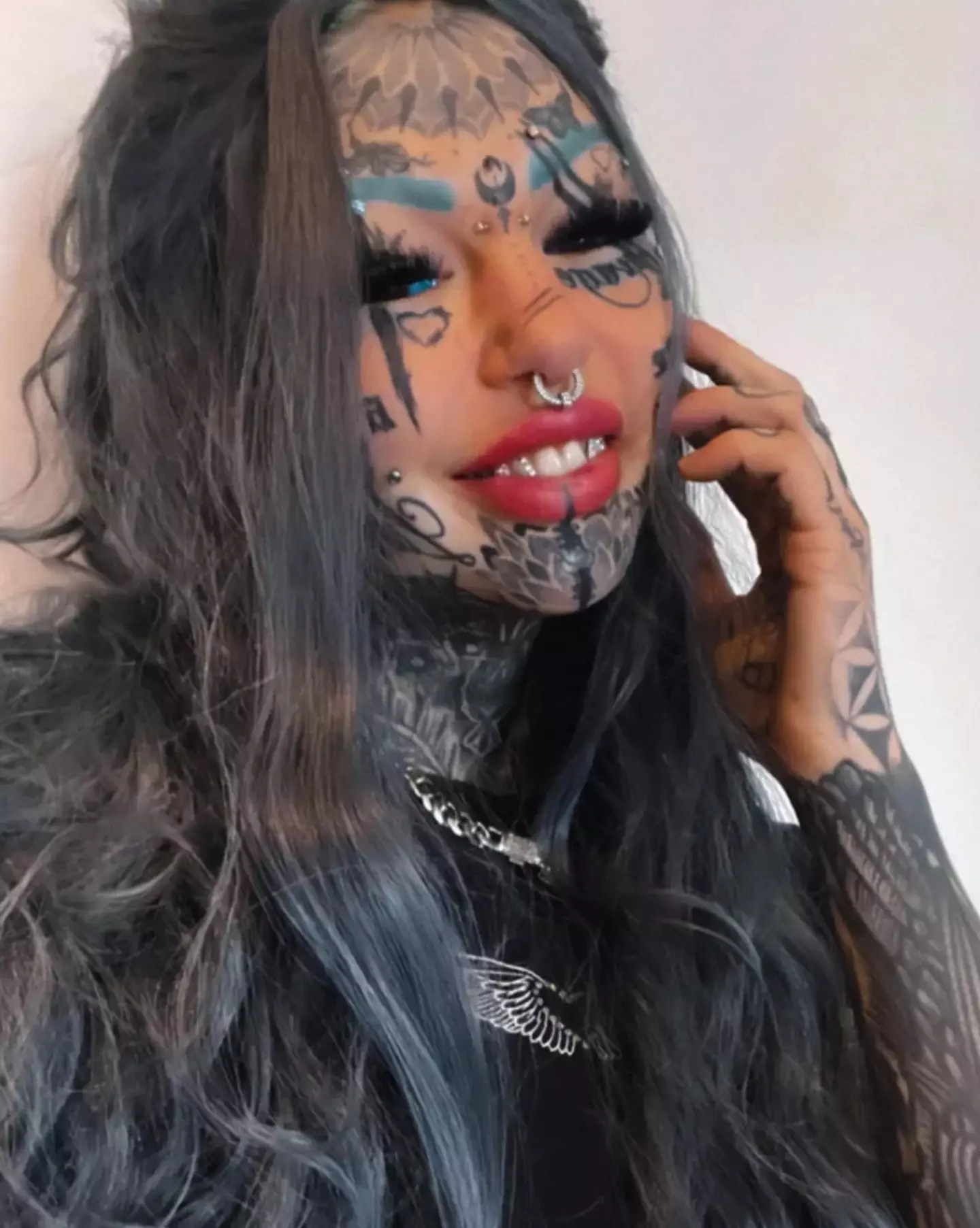 Luke even has her eyeballs tattooed.