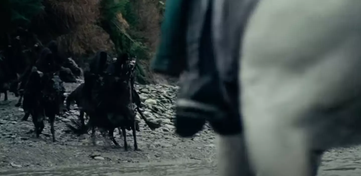 The Nazgul confronting Arwen and Frodo at the river.