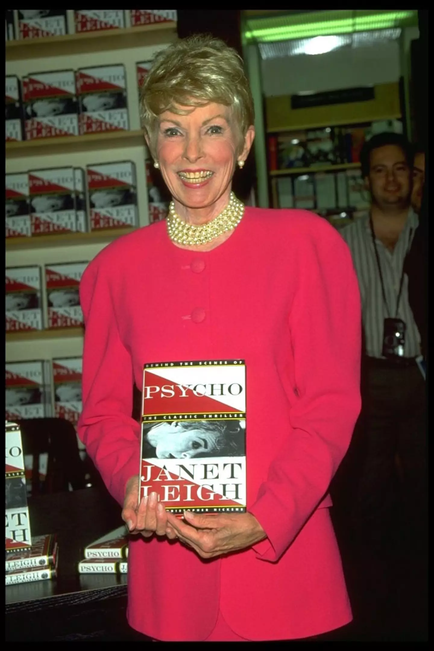 Janet Leigh with her book in 1995 (Rick Maiman/Sygma via Getty Images)