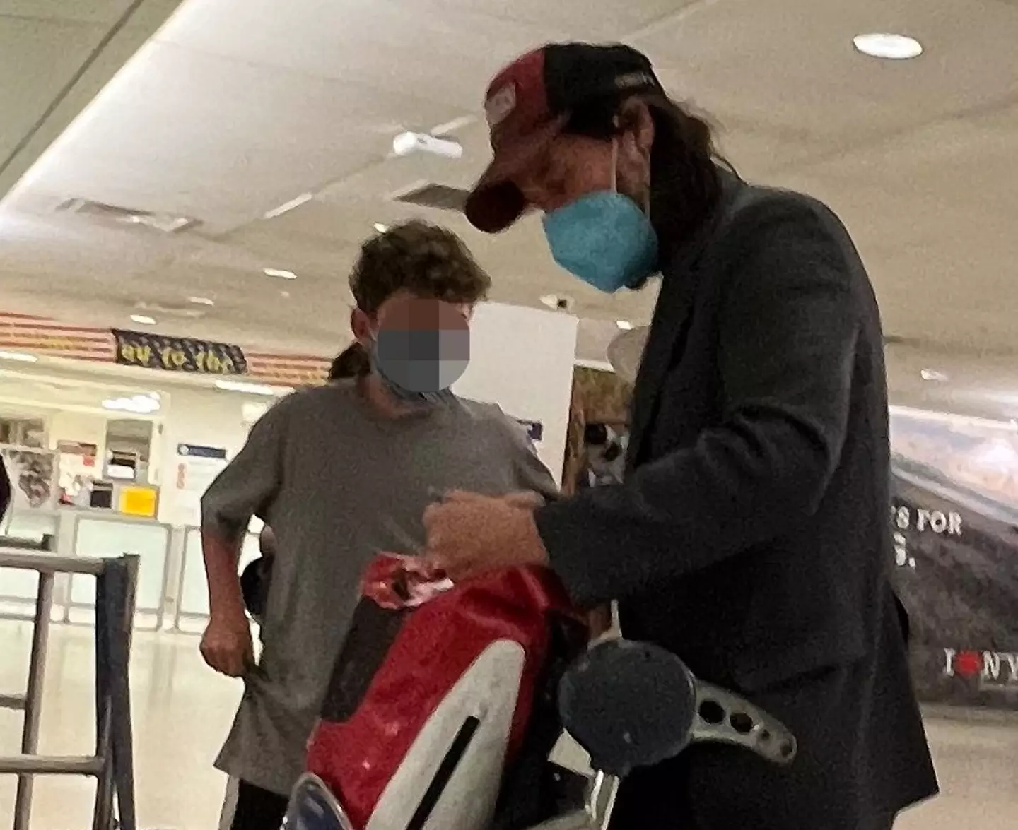 The fan was asking Reeves lots of questions.