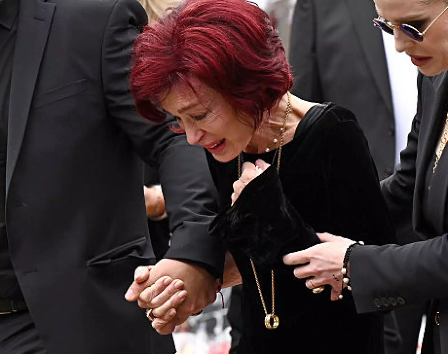 Sharon could be seen with the ring around her neck (Leon Neal/Getty Images)