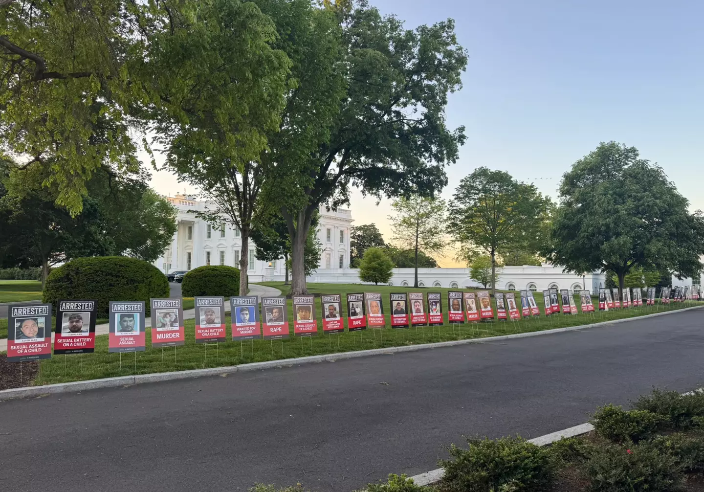 The White House lawn features images of people arrested (X/@Kaelan47)