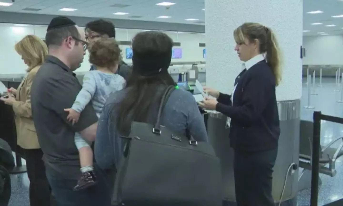 The family claim they were kicked off the American Airlines flight due to their body odor.