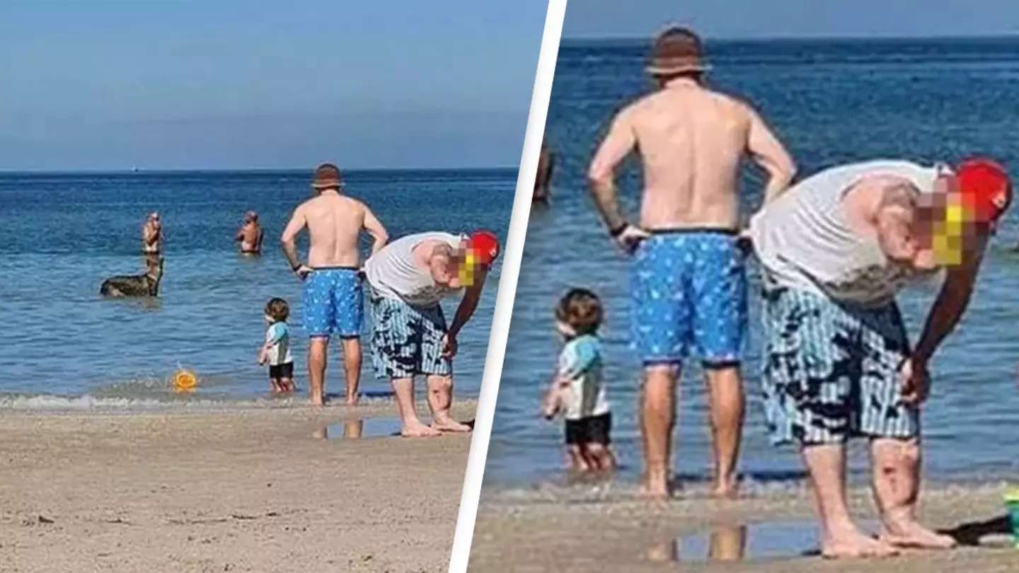 Family left horrified after spotting chilling detail in background of beach photo