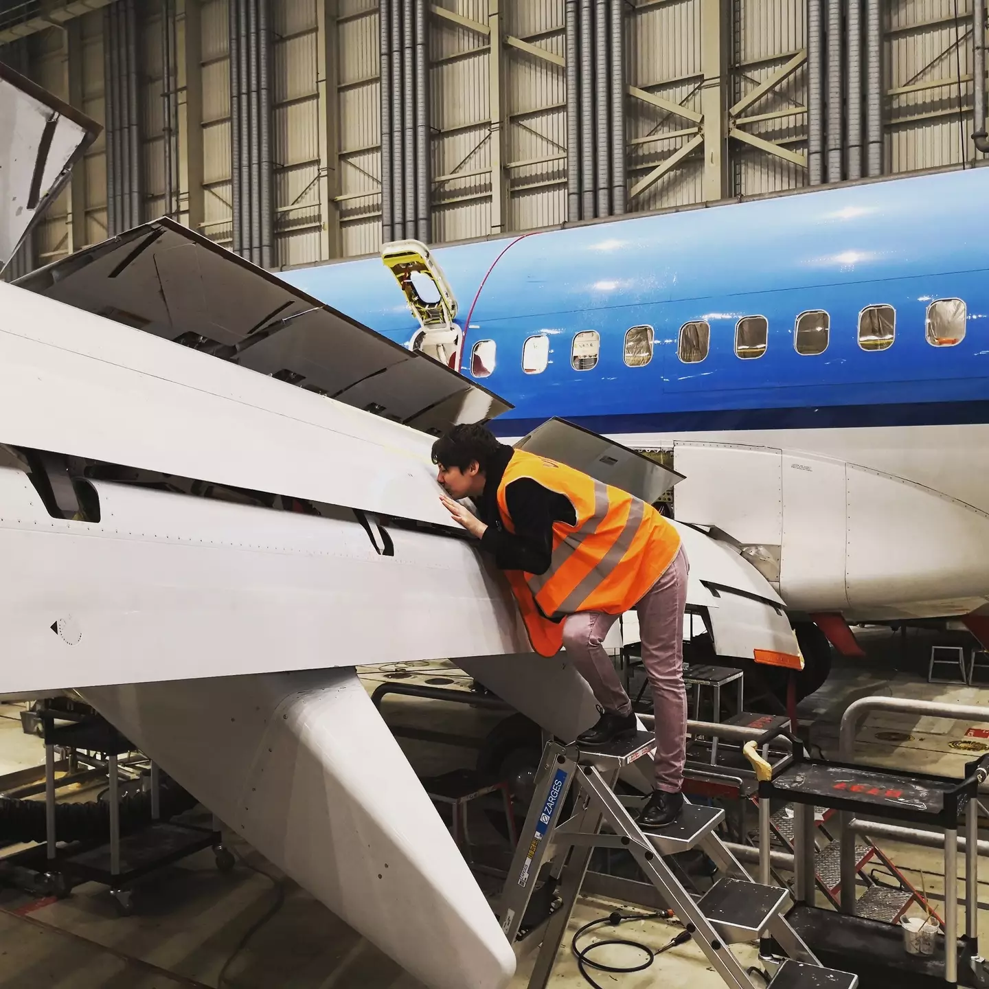 Michele spent time with Darling inside the aircraft hangar. (East2West News)