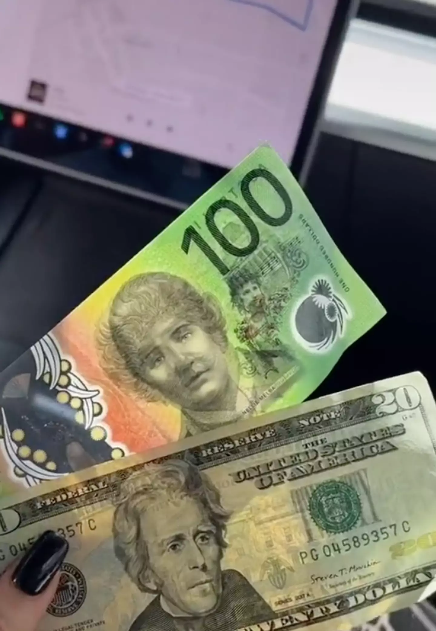 Testa also asked followers what note they prefer out of Australian and American, flashing two 100 dollar bills.