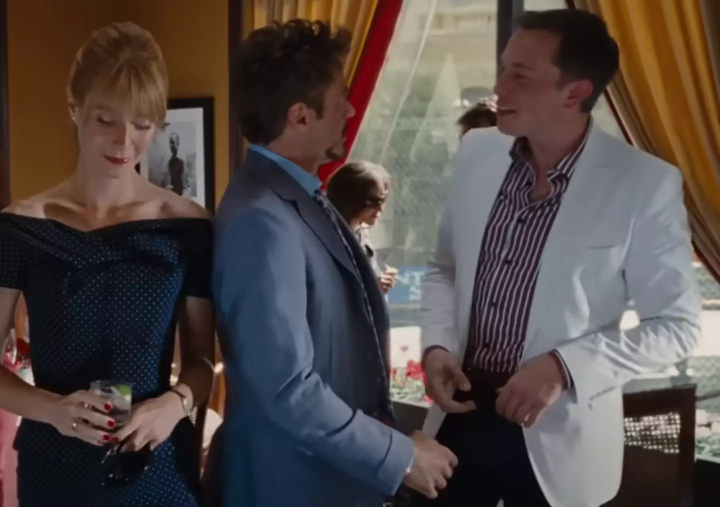 Tony Stark and Pepper Potts bump into Musk and exchange pleasantries. (Paramount Pictures/ Walt Disney Studios Motion Pictures)