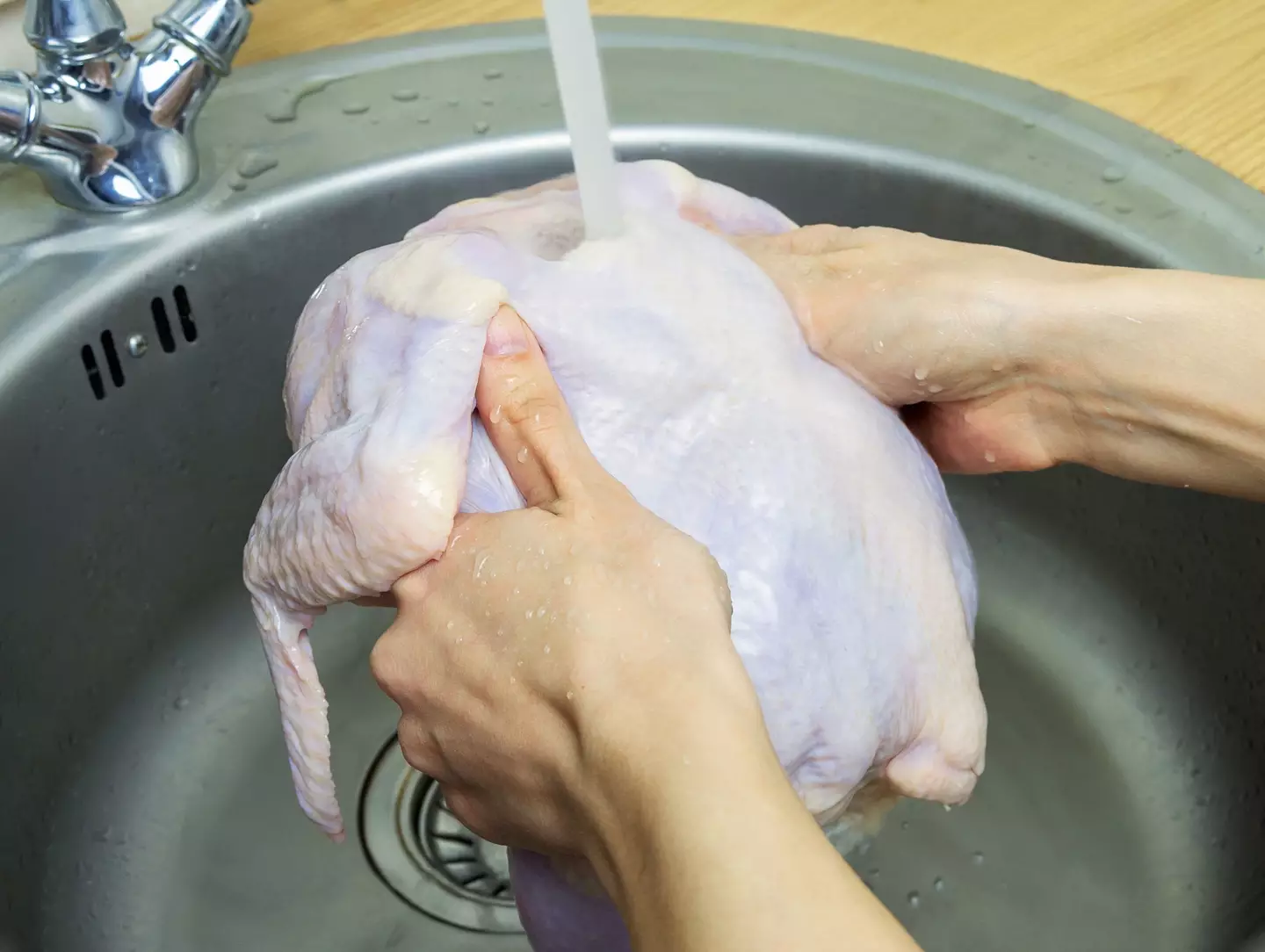Washing raw turkey is simply put a 'no-no' so next time you or anyone thinks of doing so, explain to them why (Getty stock)