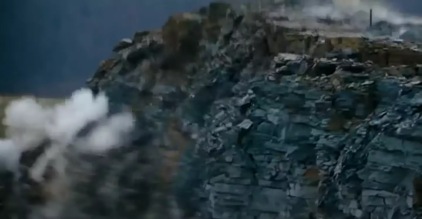 The scene of the cliff exploding was not included in the final film.