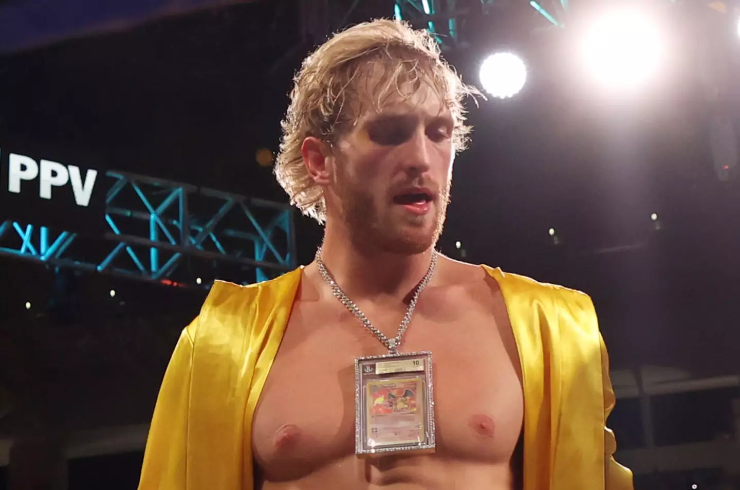 Logan Paul wears a Charizard Pokemon card chain around his neck prior to his exhibition fight against Floyd Mayweather in 2021 (Cliff Hawkins/Getty Images)