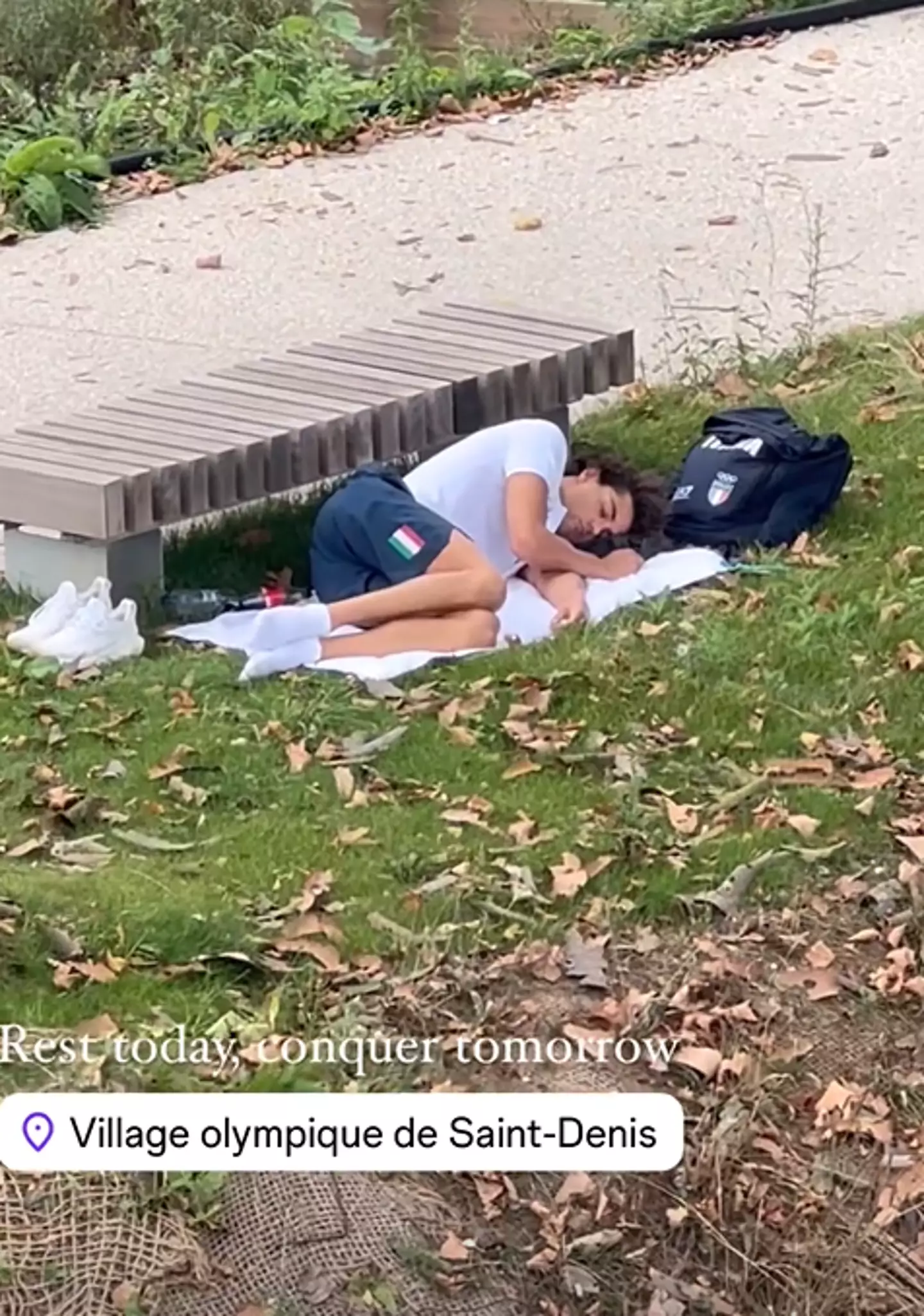 The swimmer was spotted napping beside a bench. (Instagram/@huseinalireza)