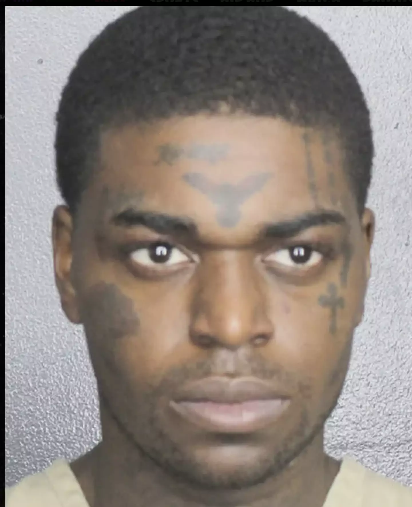 Kodak's mugshot from his arrest last month in Florida.