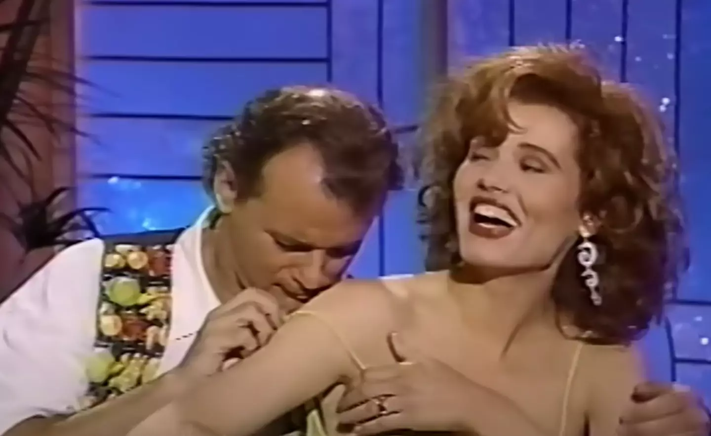 The pair's appearance on The Arsenio Hall Show saw Murray take down one of Davis' dress straps.