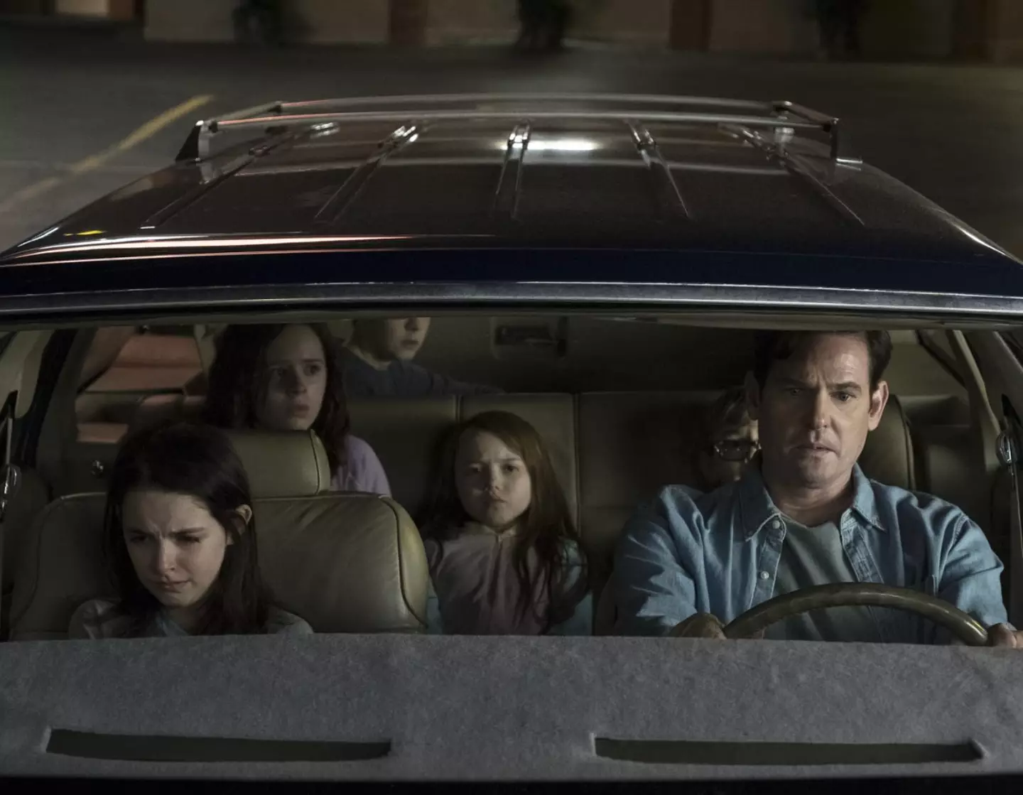 The Haunting of Hill House sees a fractured family return to their home and confront their haunted past. (Steve Dietl/Netflix)