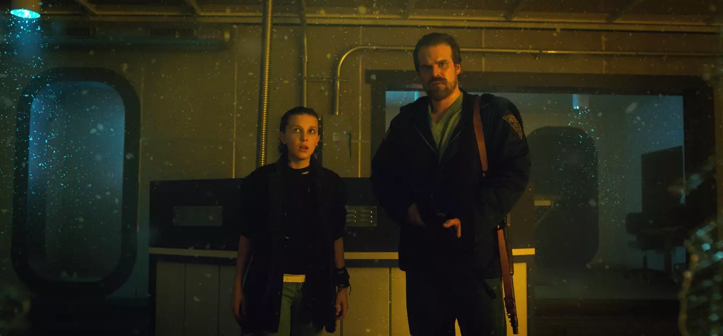 Millie Bobby Brown and David Harbour in Stranger Things.