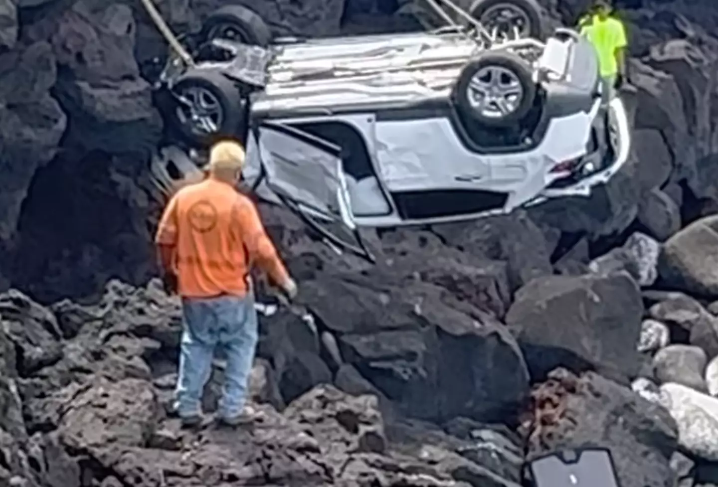 After surviving the fall the driver then fell into the sea.