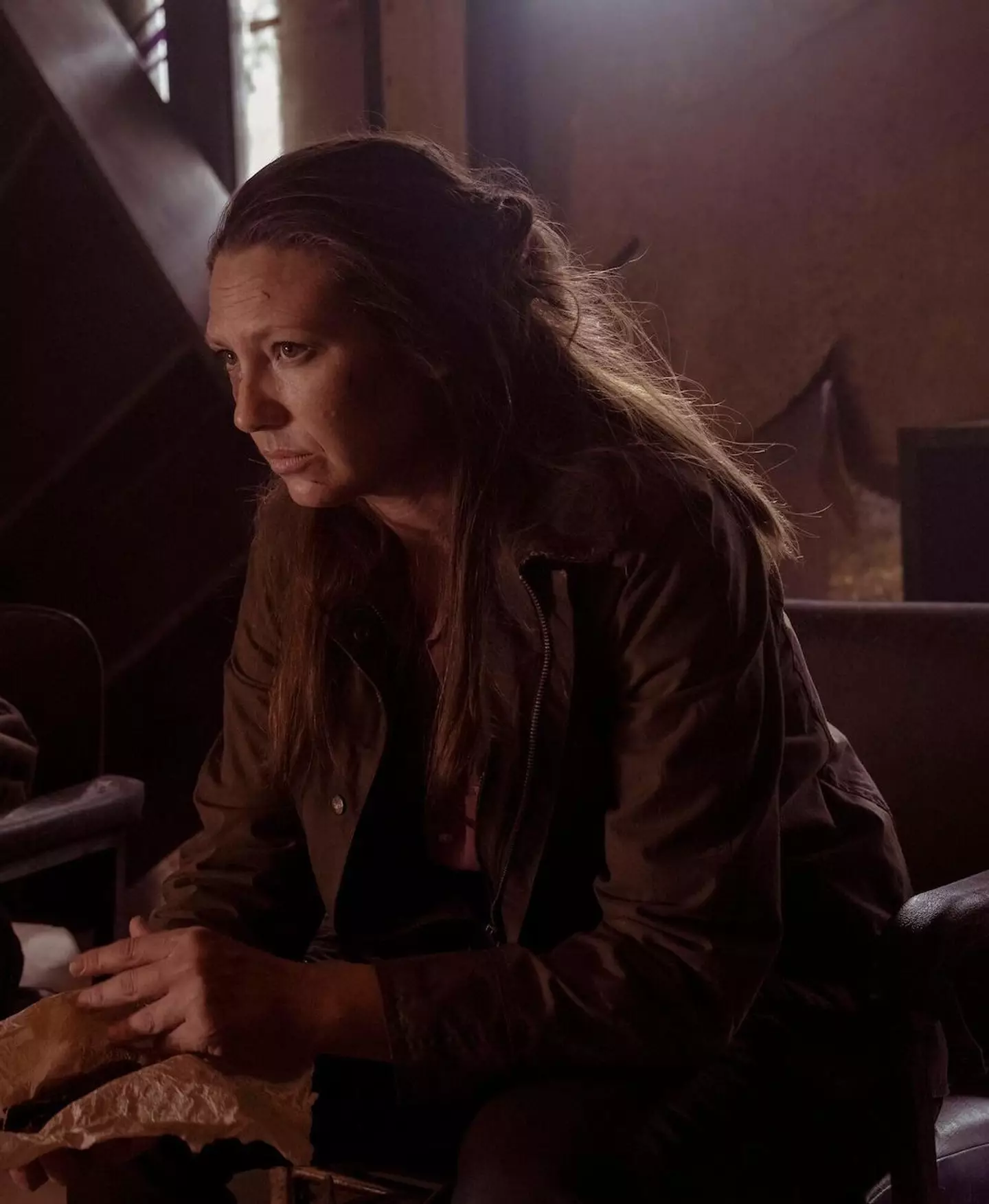 Anna Torv plays Joel's smuggler partner Tess.