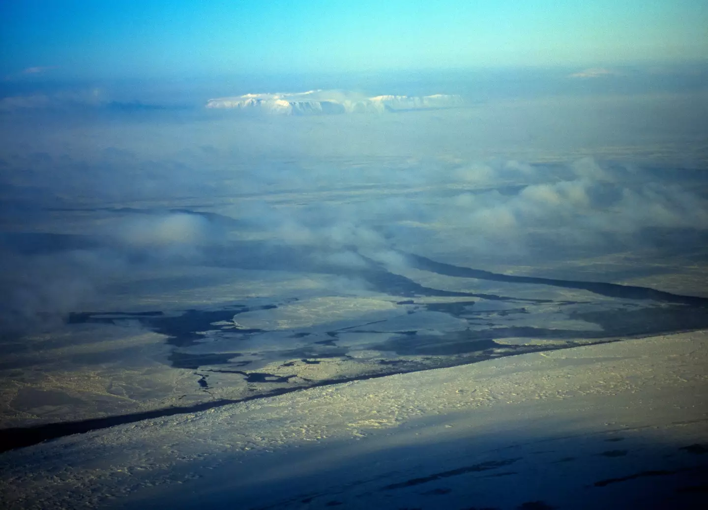 A wintry aerial shot of both Big and Little Diomede.