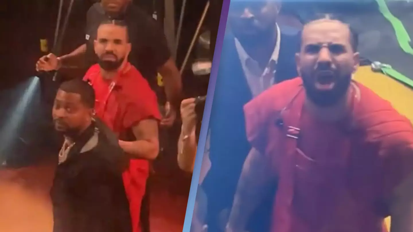 Drake rips into male fan for wrestling with a woman over his sweat towel after concert