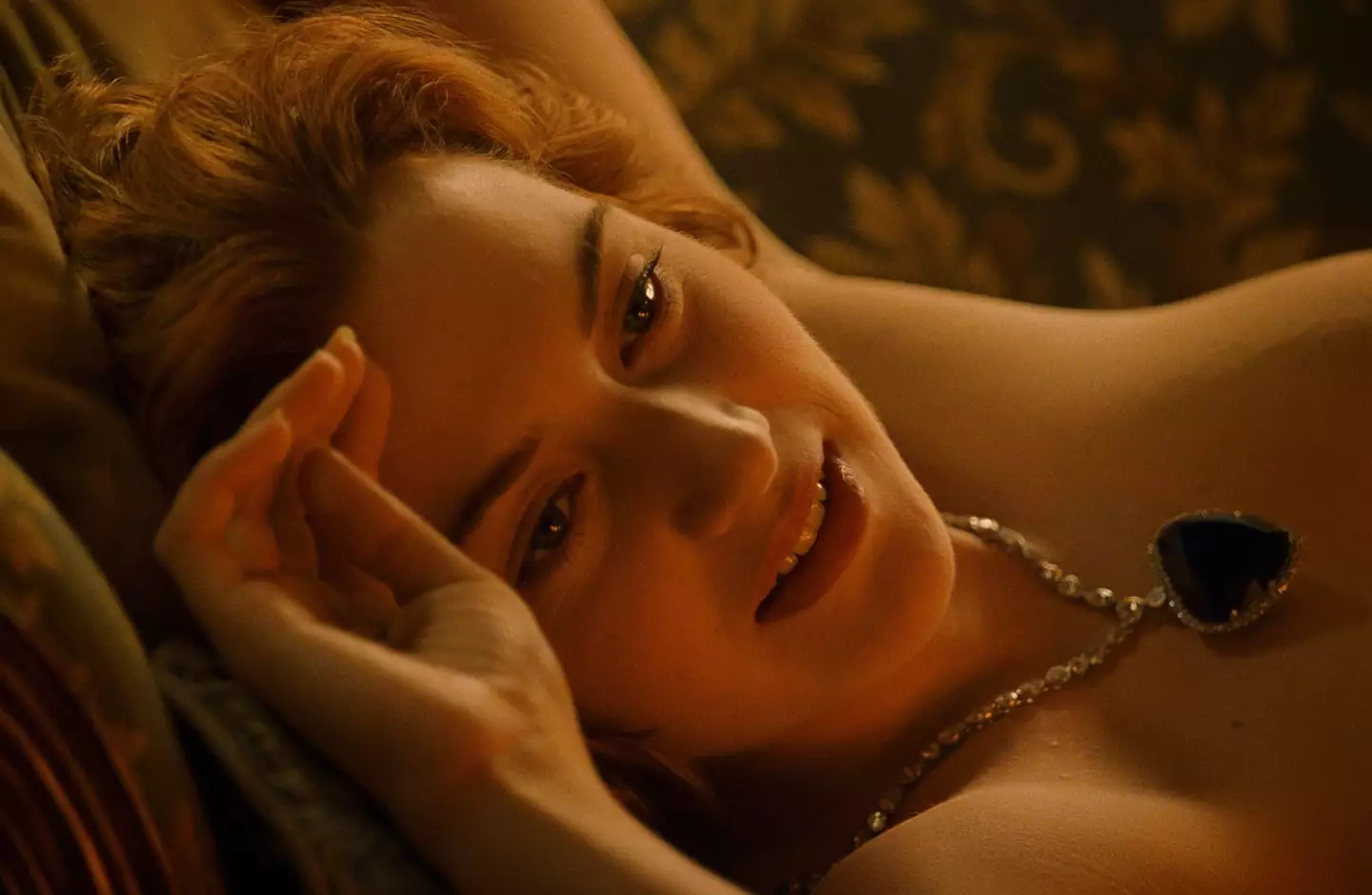 Winslet wears nothing but a necklace in the scene.