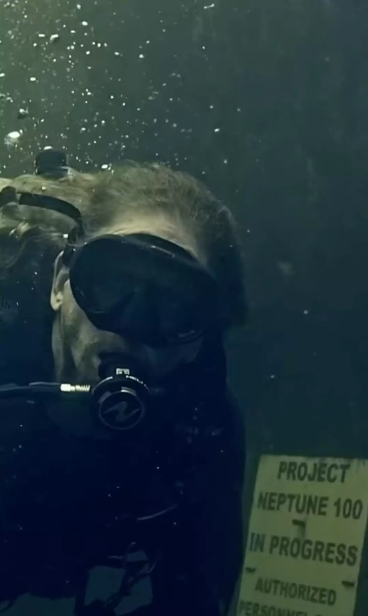 The retired U.S. naval officer is doing experiments to see how his body reacts to pressure underwater.